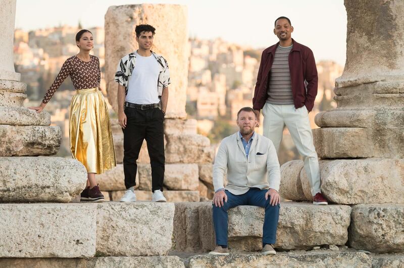 Naomi Scott, Mena Massoud, Guy Ritchie and Will Smith in Amman. Getty Images