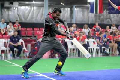 UAE batsman Isuru Umesh plays a shot during the match against England at the Indoor Cricket World Cup at Insportz club in Dubai. Indoor Cricket World Cup