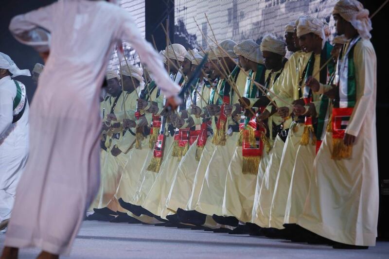 Emirati performers during the 42nd National Day celebrations being held on Flag Island in Sharjah. Antonie Robertson/The National