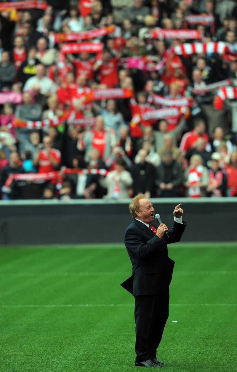 2009: Gerry Marsden sings 'You'll Never Walk Alone' during a memorial service to mark the twentieth anniversary of the Hillsborough disaster at Anfield in Liverpool, north-west England.  AFP