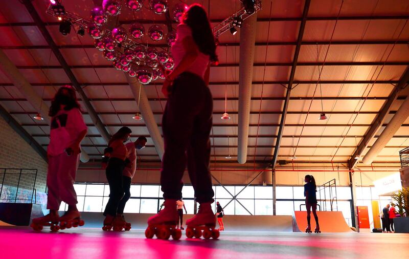 People doing roller skating at the RollDXB roller disco which opens at Shed 3 Marina Cubes Street, Dubai Maritime City, Port Rashid, Bur Dubai on April 25,2021. (Pawan Singh/The National). Story by Sophie Prideaux 