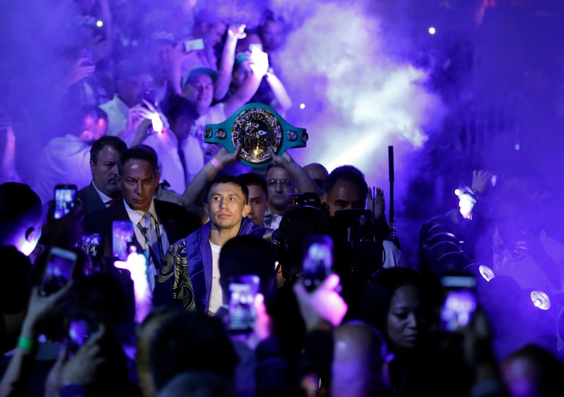 Gennady Golovkin walks to the ring for his title fight against Saul 'Canelo' Alvarez. Golovkin was putting his IBF, WBA and WBC middleweight belts on the line. John Locher / AP Photo