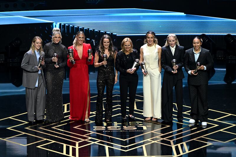 Keira Walsh, Alessia Russo, Mary Earps, Ella Toone, Lucy Bronze, Alex Greenwood, Lauren James, alongside Fifa Women's Coach of the Year, Sarina Wiegman, fourth from right. Getty