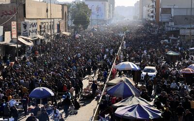 People crowd at Al Ghazal animal market in Baghdad. Reuters
