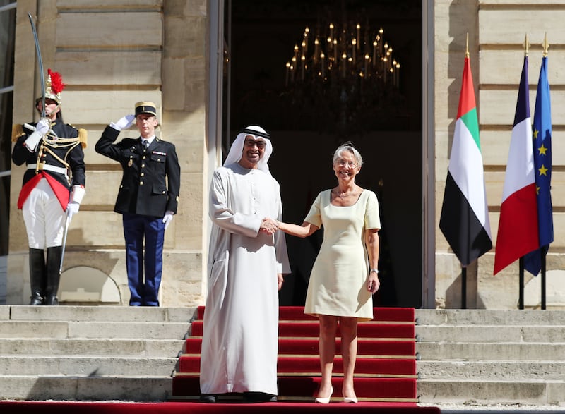 Sheikh Mohamed arrives at Matignon Hotel in Paris to meet Prime Minister Elisabeth Borne. Chris Whiteoak / The National