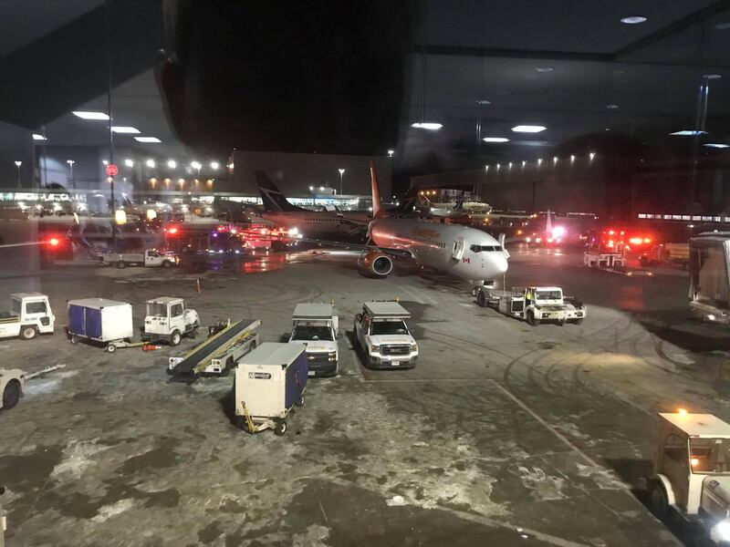 Emergency services arrive at a site where two planes collided at Toronto's Pearson Airport, Canada, January 5, 2018 in this still image taken from social media video. John-Ross Parks/via REUTERS THIS IMAGE HAS BEEN SUPPLIED BY A THIRD PARTY. MANDATORY CREDIT. NO RESALES. NO ARCHIVES