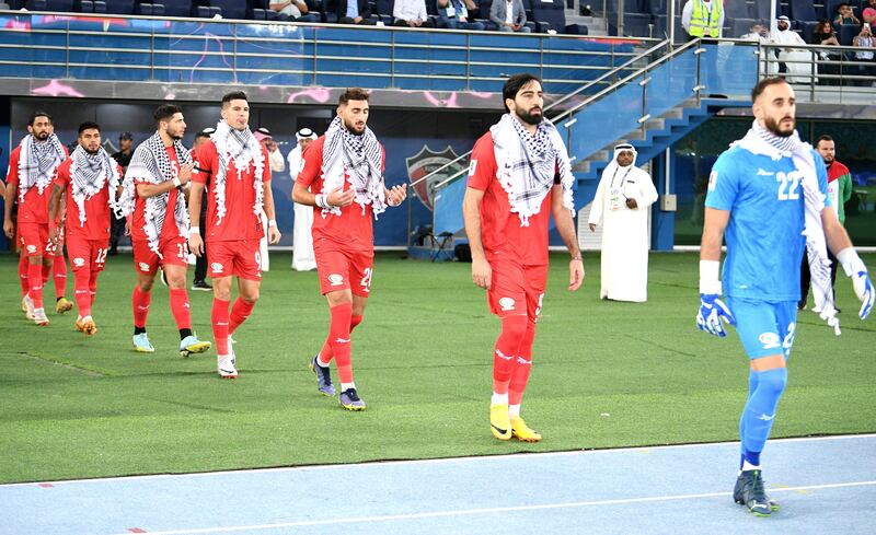Palestine goalkeeper Rami Hamada leads his team to the pitch for the 2026 World Cup qualifier against Australia in Kuwait on Tuesday, November 21, 2023. EPA