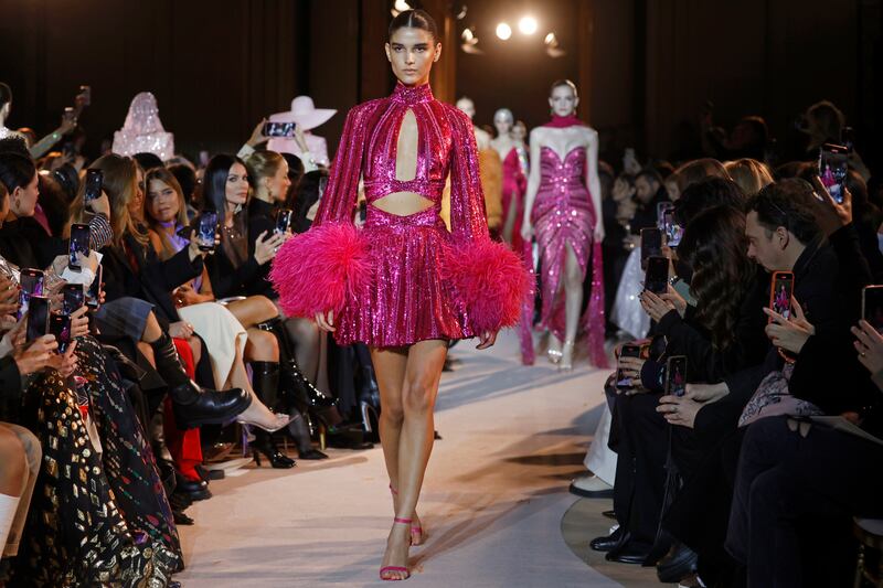 Sequins and feathers in hot pink at the Zuhair Murad show.  Getty Images