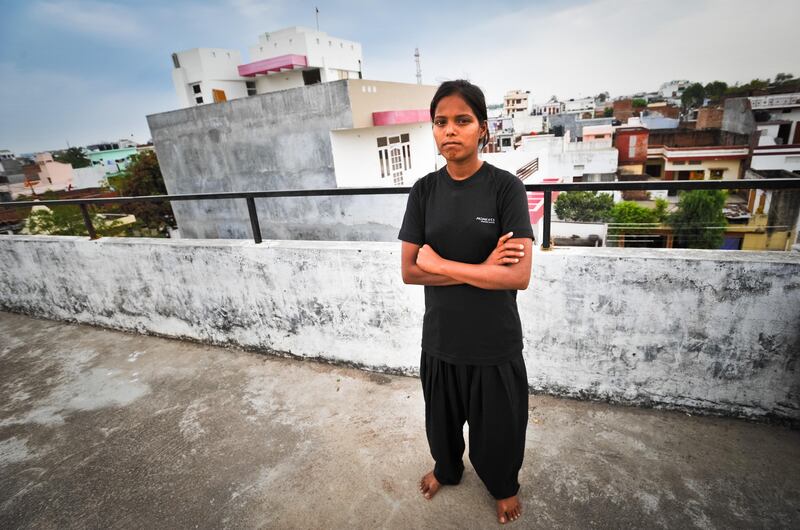 Preeti Verma, 17, member of the Red Brigade. The Red Brigade was formed in November 2010 to fight back against a growing number of sexual attacks on women in the Madiyav area of the city of Lucknow, in Uttar Pradesh state, India.
The group of young women wear distinctive red and black salwar kameez. Most have been victims of sexual assault and have resolved that they will take no more. They take direct action against their tormentors and now when a local man steps out of line, he can expect a visit from the Red Brigade and a thrashing.