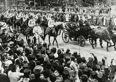 Mandatory Credit: Photo by Len Putnam/AP/Shutterstock (7395286a)
Thousands lining one of Cairo's streets, Egypt cheering King Farouk seen driving with Ali Maher Pasha, who was then premier on . When Egypt's New King Farouk, returned to Cairo from England following the death of his father Fuad. The population showed their loyalty in spontaneous outbursts of rejoicing, thousands thronging the streets
Egypt Arrival of King Farouk, Cairo, Egypt