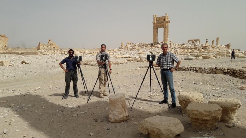 Members of the French team from Art Graphique & Patrimoine with 3D scanners at Palmyra last year.