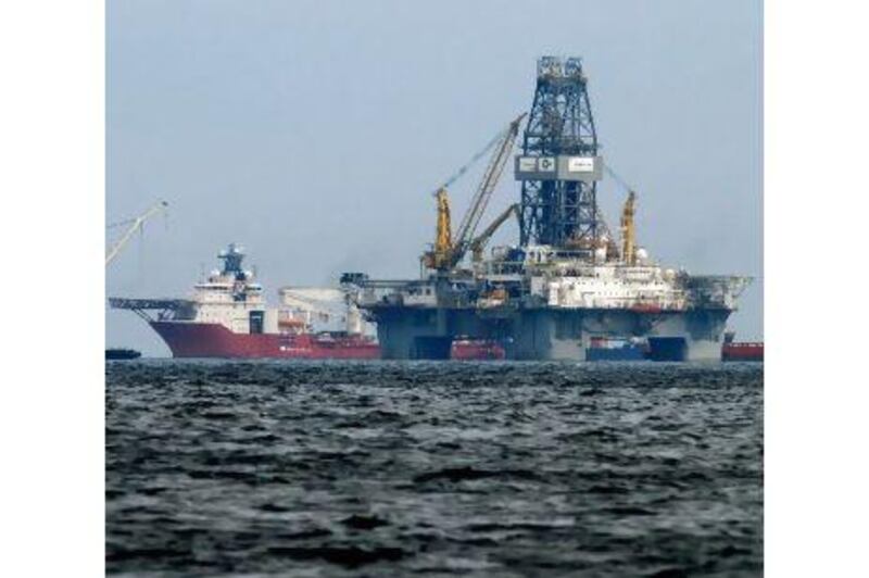 Aker's ships and relief well rigs work above the sunken Deepwater Horizon oil rig in the Gulf of Mexico to contain the spill.