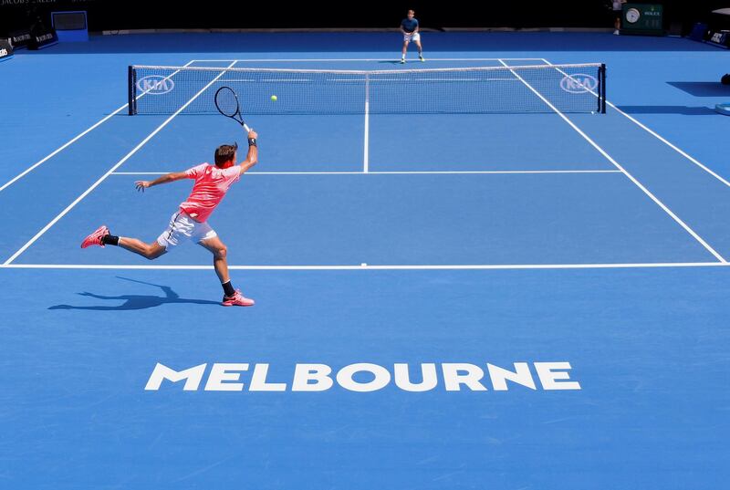 Tennis - Australian Open - Melbourne Park, Melbourne, Australia, January 11, 2018. Switzerland's Roger Federer hits a shot during a practice session with Belgium's David Goffin on Rod Laver Arena ahead of the Australian Open tennis tournament.    REUTERS/David Gray