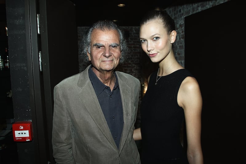 Patrick Demarchelier and Karlie Kloss attend the Glamour dinner for Patrick Demarchelier as part of Paris Fashion Week on September 29, 2013. Getty Images