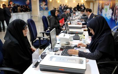 People register as candidates for parliamentary elections set for February 2020, at the interior ministry in Tehran, Iran, Sunday, Dec. 1, 2019. (AP Photo/Ebrahim Noroozi)