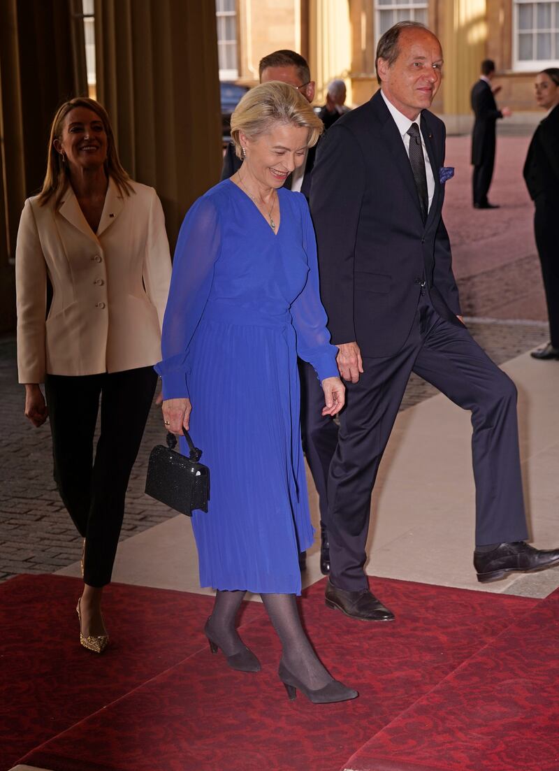 President of the European Commission Ursula von der Leyen and her husband Heiko arrive at the reception. PA
