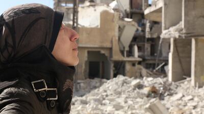 Al Ghouta, Syria - Dr Amani amongst rubble. (National Geographic)