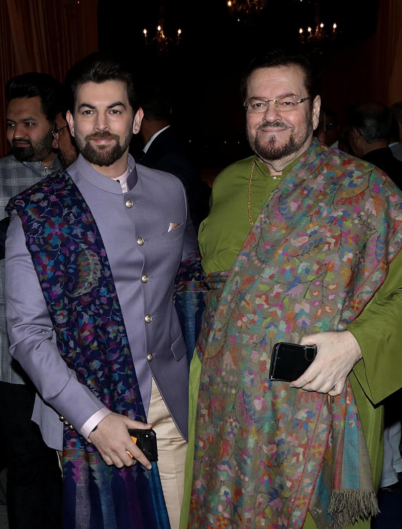 Actor Neil Mukesh (L) with his father, singer Nitin Mukesh