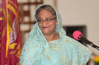 Sheikh Hasina smiles as she is sworn in for her fourth spell as Bangladesh's prime minister at the Presidential Palace in Dhaka on January 7, 2019. Sheikh Hasina was sworn in as Bangladesh's prime minister for a record fourth term January 7 after a crushing election victory marred by deadly violence and claims of widespread rigging.
 / AFP / Munir UZ ZAMAN
