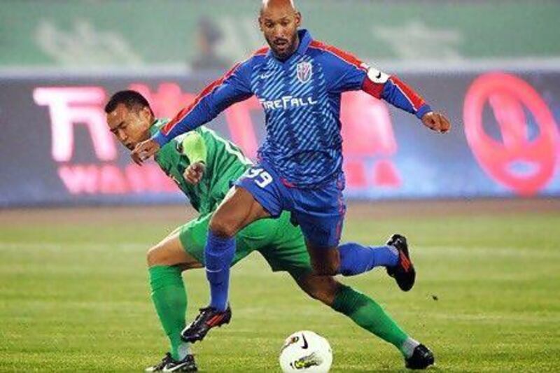 In China's football leagues, a willingness to pay for foreign players is even more apparent, even though the clubs generate modest revenues, a reported $3m a year in the case of the Chinese Super League's Shanghai Shenhua. Above, French International player Nicolas Anelka from Shanghai Shenhua. AFP
