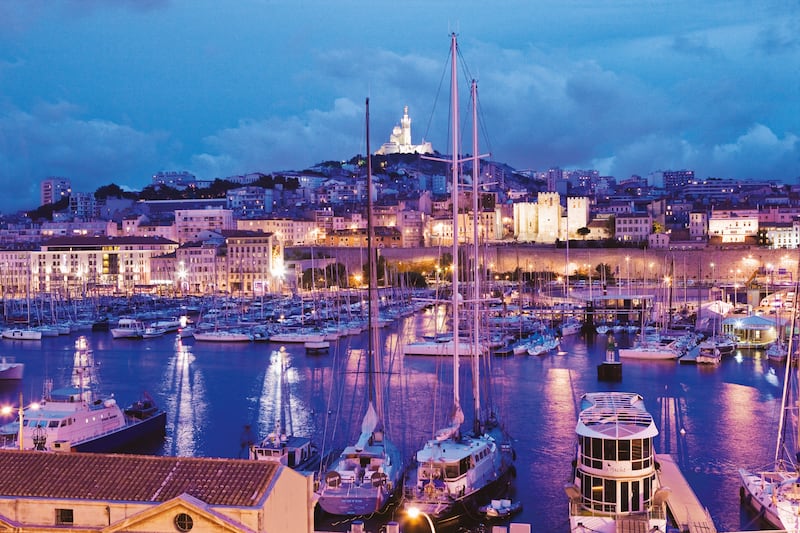 31 Aug 2011, Marseilles, France --- France, Provence-Alpes-Còte-d'Azur, Marseille . View of the Vieux Port (Old Port), on the background the Basilique (basilica, church) Notre Dame de la Garde --- Image by © Atlantide Phototravel/Corbis