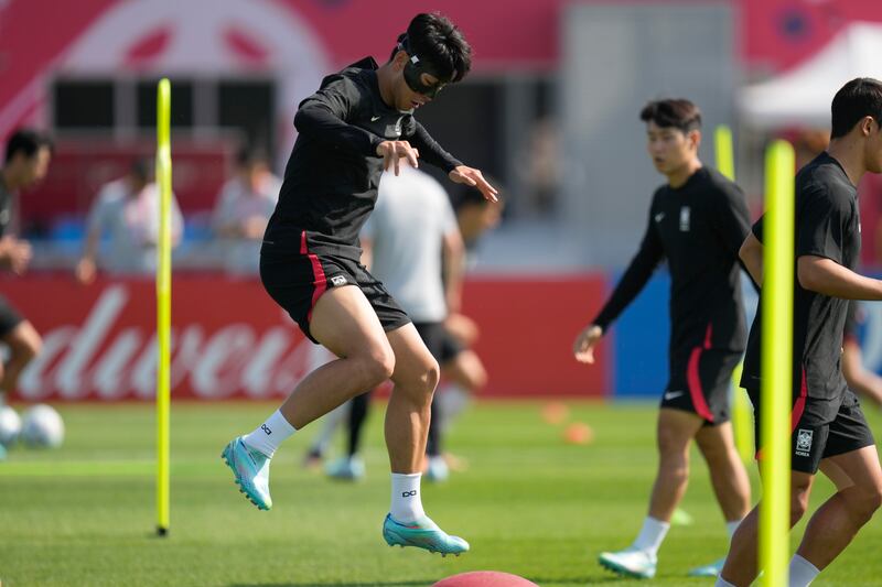 South Korea's Son Heung-min warms up during training on Sunday, December 4, 2022 - on the eve of the World Cup round of 16 match against Brazil. AP