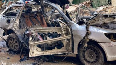 A destroyed vehicle in which three sons of Hamas leader Ismail Haniyeh were reportedly killed by an Israeli air strike on Gaza. AFP