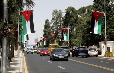 Amman's streets have been decorated with Jordanian flags in celebration. Reuters