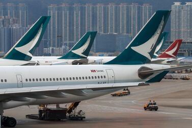 Cathay Pacific Airways planes park at the Hong Kong International Airport. AP