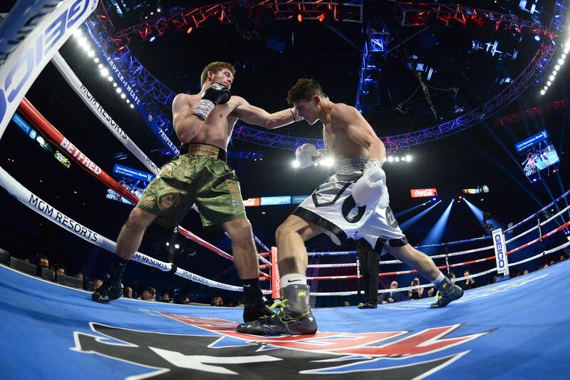 Vito Mielnicki (white trunks) and Corey Champion (green trunks) box during their welterweight bout at MGM Grand Garden Arena, Las Vegas.  Reuters