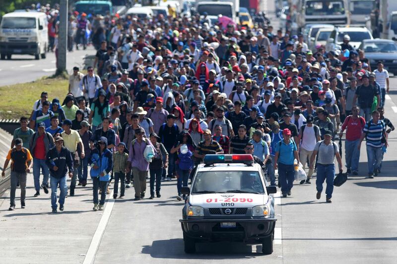 Migrants embark on a journey to the US, in San Salvador, El Salvador. Marvin Recinos / AFP