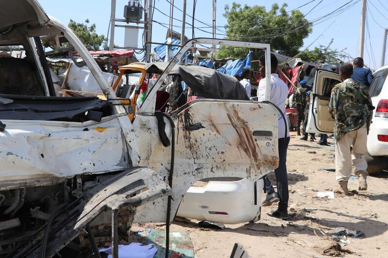 A minibus that was damaged during the car bomb is seen in Mogadishu. AFP