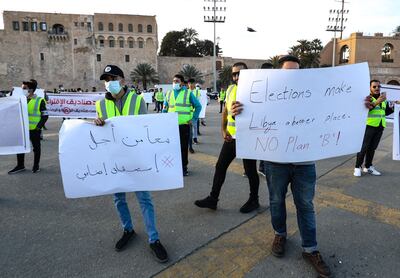 A group of Libyan activists protest against the postponement of the presidential elections in Tripoli. AFP