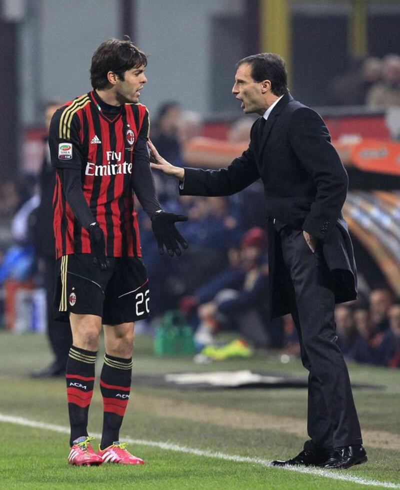 AC Milan's Kaka debates with coach Massimiliano Allegri during their match against Roma at San Siro stadium. Alessandro Garofalo / Reuters
