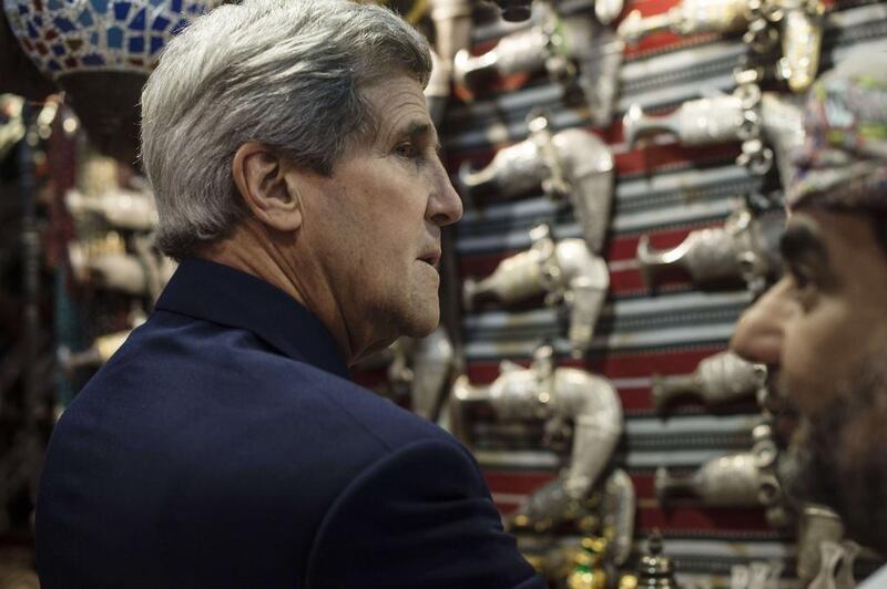 Mr Kerry looks at daggers as he visits the Mattrah Souq in Muscat. Iran, the United States and the European Union began an unscheduled second day of talks on Monday over disagreements blocking the resolution of a confrontation over Tehran’s nuclear program, U.S. and Iranian officials said. Nicholas Kamm / AP