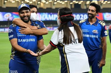 Mumbai Indians owners Nita Ambani and Akash Ambani with Rohith Sharma during the final of season 13 of the Dream 11 Indian Premier League (IPL) between the Mumbai Indians and the Delhi Capitals held at the Dubai International Cricket Stadium, Dubai in the United Arab Emirates on the 10th November 2020. Photo by: Samuel Rajkumar / Sportzpics for BCCI