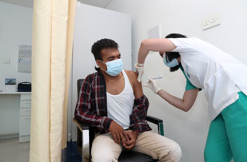 Mohammad Mohamm receives his Pfizer Covid-19 vaccine at the NMC Royal Hospital DIP in Dubai.