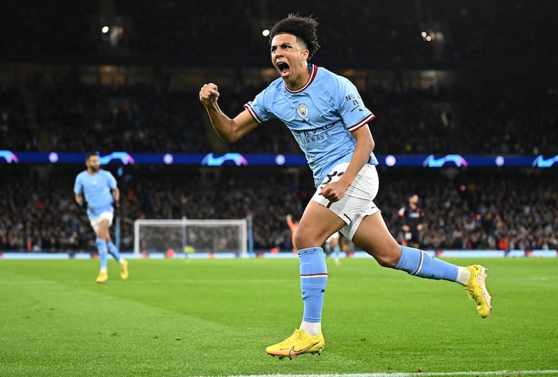 City's Rico Lewis celebrates after scoring their first to level at 1-1 in the 3-1 Champions League win against Sevilla on November 2, 2022. AFP