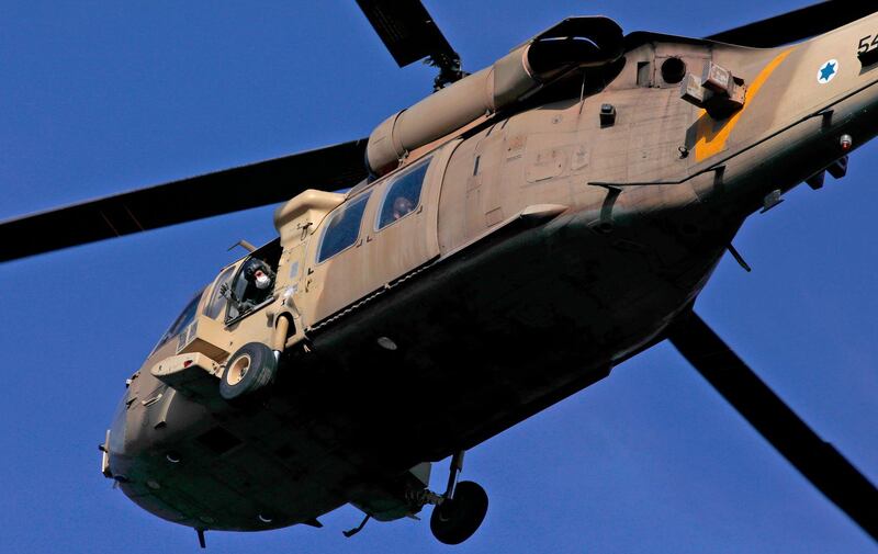 An Israeli airforce Blackhawk helicopter transports US Secretary of State Mike Pompeo to the Israeli-annexed Golan Heights. AFP