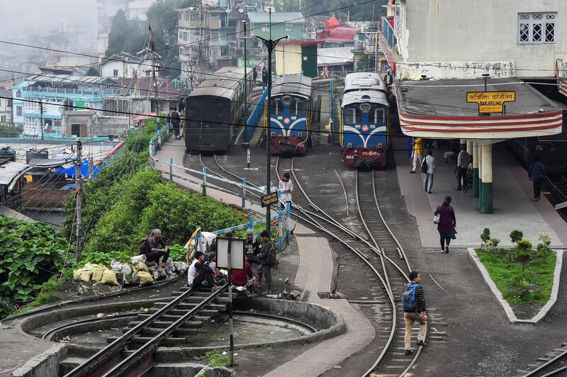 Darjeeling Himalayan Railway trains are seen at a station in Darjeeling.