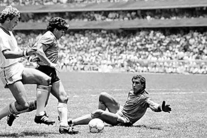 Argentina's Diego Maradona, centre, rounds Terry Butcher, left, the England defender, and Peter Shilton, the goalkeeper, before scoring what is arguably the greatest World Cup goal ever.