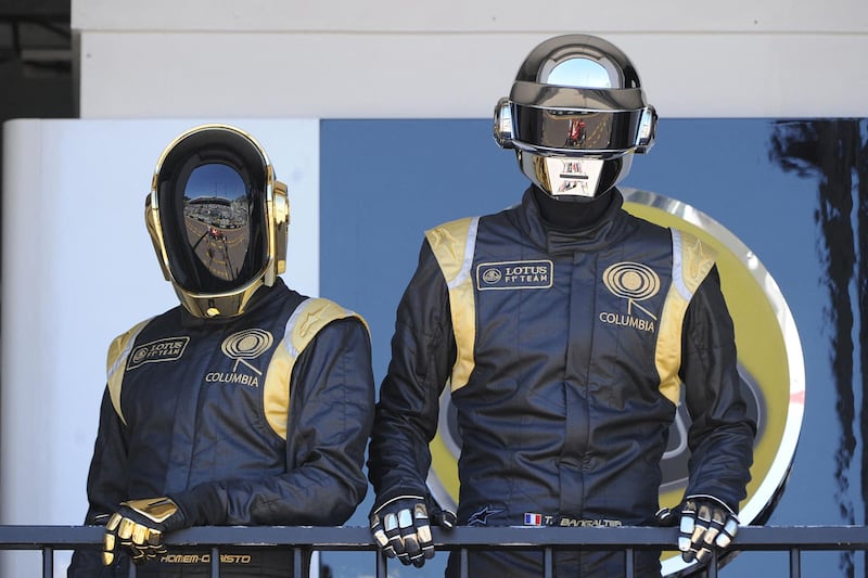 Daft Punk pose in the pits at the Monaco Formula One Grand Prix at the Circuit de Monaco in Monte Carlo in 2013. AFP