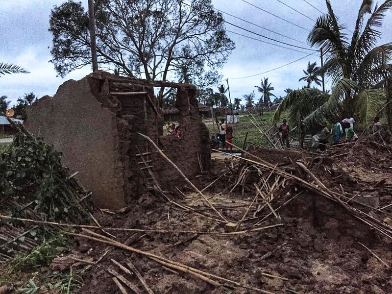 Residents survey the damage in Nacate village, south of Macomia, Mozambique, following the destruction by Cyclone Kenneth.  Heavy rains from a powerful cyclone lashed northern Mozambique on, sparking fears of flooding as aid workers arrived to assess the damage, just weeks after the country suffered one of the worst storms in its history.  AFP