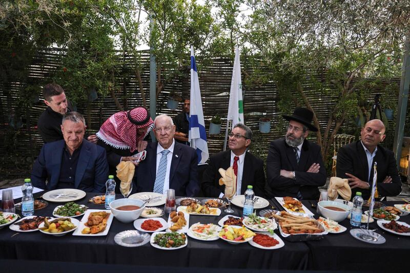 From left: Israeli high-tech and social entrepreneur Erel Margalit, Israel's President Reuven Rivlin, the mayor of the Arab-Israeli town of Abu Ghosh Salim Jaber, and the Ashkenazi Chief Rabbi of Israel David Lau attend an iftar meal in Abu Ghosh, near Jerusalem. AFP
