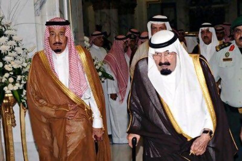 Saudi Arabia's King Abdullah (R) and Prince Salman arrive in Mecca to attend the funeral of Crown Prince Nayef.