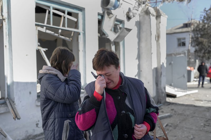 Nurses in tears after Russian shelling of a psychiatric hospital in Mykolaiv, southern Ukraine. AFP