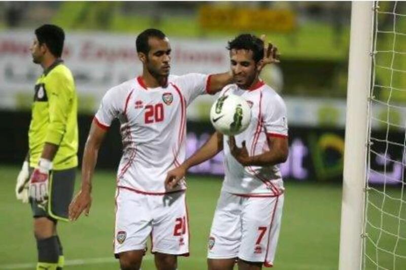 Ali Mabkhout, right, scored four goals for the UAE against Bahrain in Dubai tonight. Pawan Singh / The National