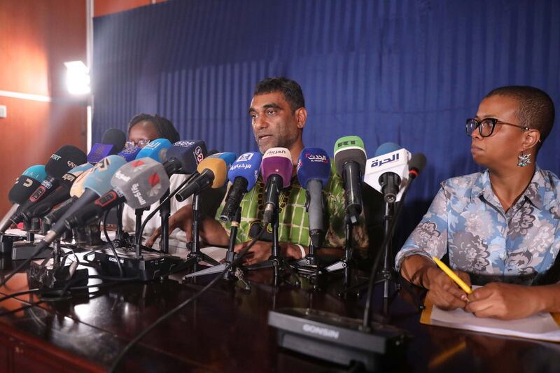 epa07840655 Amnesty International Secretary General Kumi Naidoo (C) speaks at a press conference at the Sudanese Ministry of Information, in Khartoum, Sudan, 13 September 2019. This is the first time Amnesty International is back in khartoum since 13 years. The visit comes in the wake of the formation of a new government and a power sharing deal between the army and the opposition in August 2019, following the uprising which resulted in the ousting of the then president Omar Hassan al-Bashir  EPA/MARWAN ALI