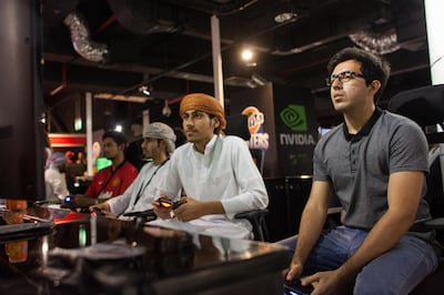Dubai, UAE - June 13, 2014 - Gamers play during the EA Sports Fifa 14 tournament at Magic Planet, Mirdif City Center. 1000 aspiring gamers will receive a pass to 'The Million Player’ tournament in Abu Dhabi. Contenders will battle in the competition to vie for a brand new car or the AED 1,000,000 grand prize.

Story: Fifa video game tournement
Photo by Clint McLean for The National
Reporter Ramola Talwar Badam Talwar
Assigned by RJ