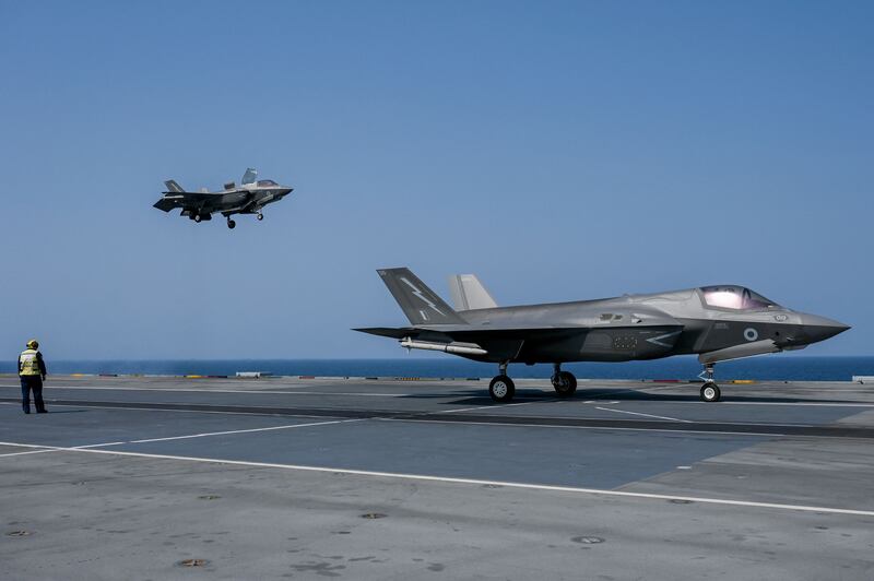 A fighter jet prepares to land on the flight deck of UK Carrier Strike Group’s 'HMS Queen Elizabeth' in the Arabian Sea, off Mumbai. AFP